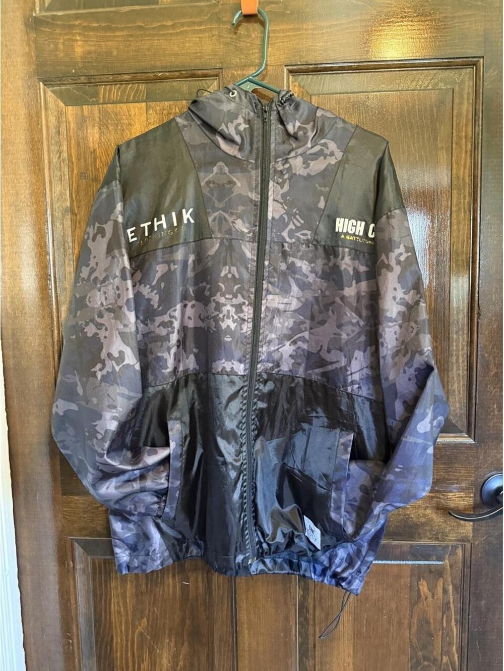 Ethik high caliber music festival camo rain jacket